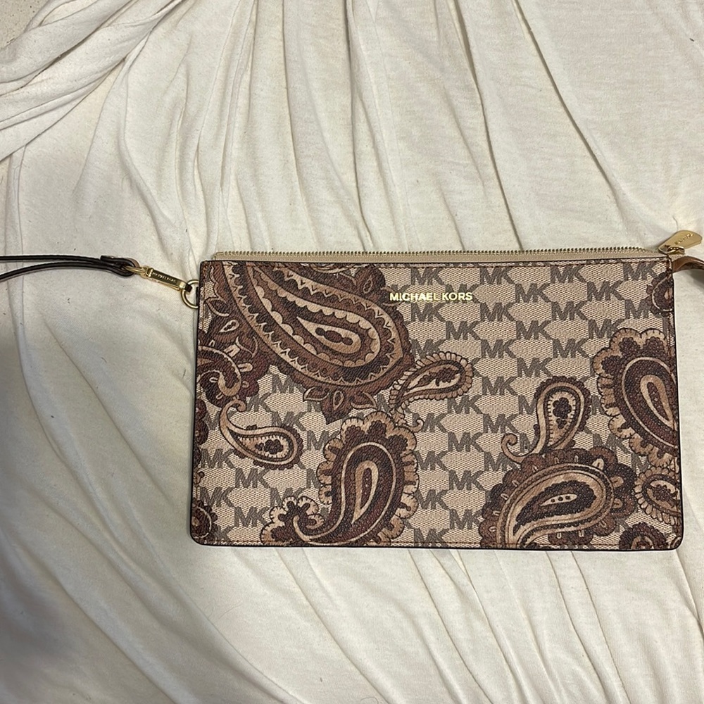 Michael Kors big wristlet. Brand new. Never used
